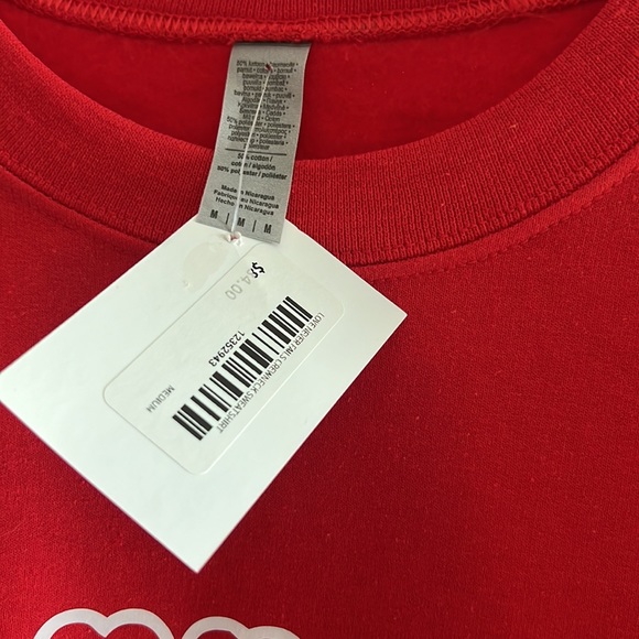 Brand new with tag. Red pullover. “Love never fails” - Picture 3 of 4
